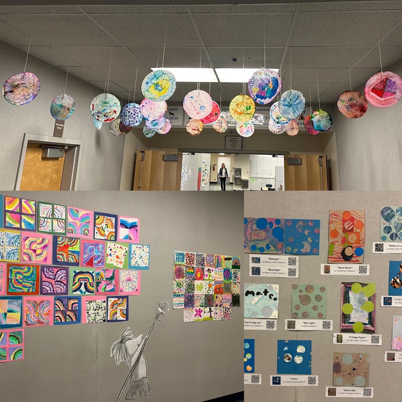 Colorful painted artworks hanging on the wall and painted coffee filters hanging from the ceiling